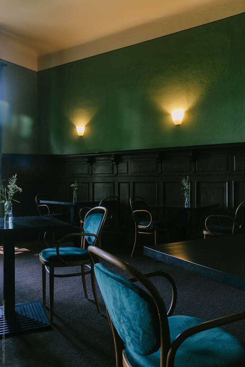 Tables in Empty Dark Restaurant