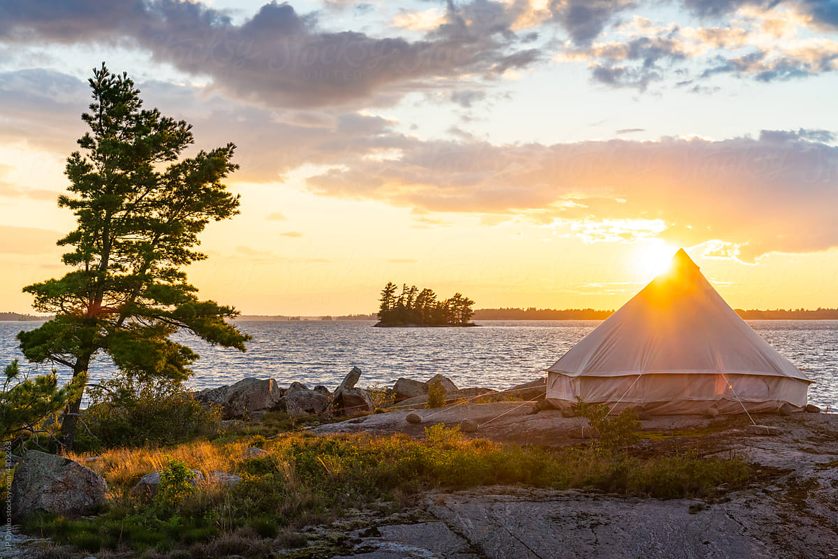 Bell Tent on Lake Shoreline Canadian Wilderness at Sunset