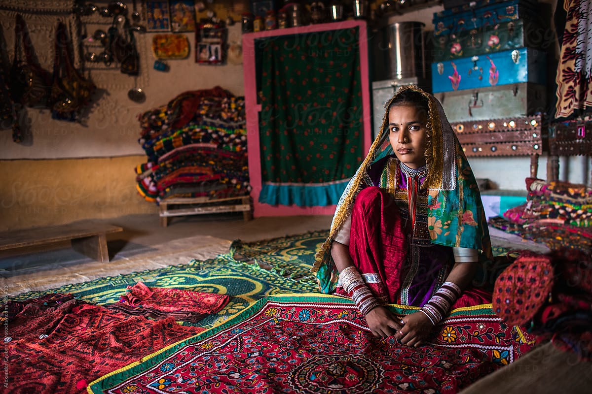 Young woman from Meghwal tribe showing handicraft