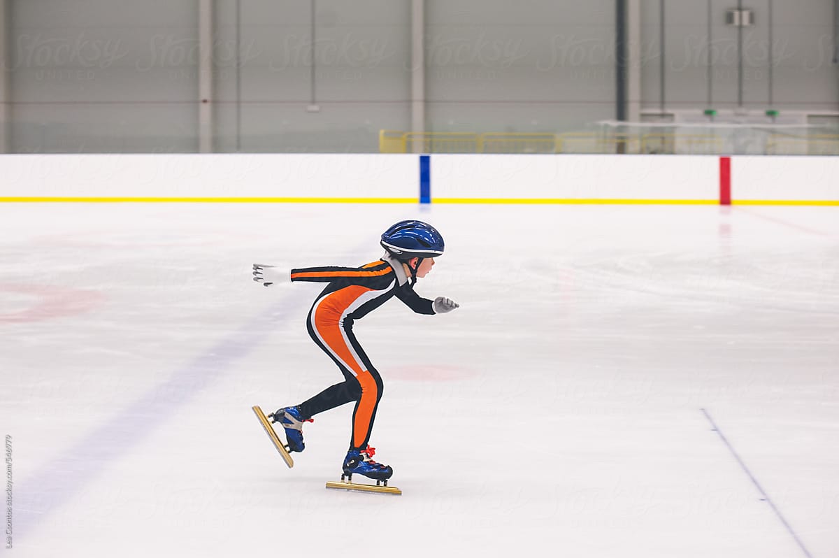 Boy practicing short track speed skating