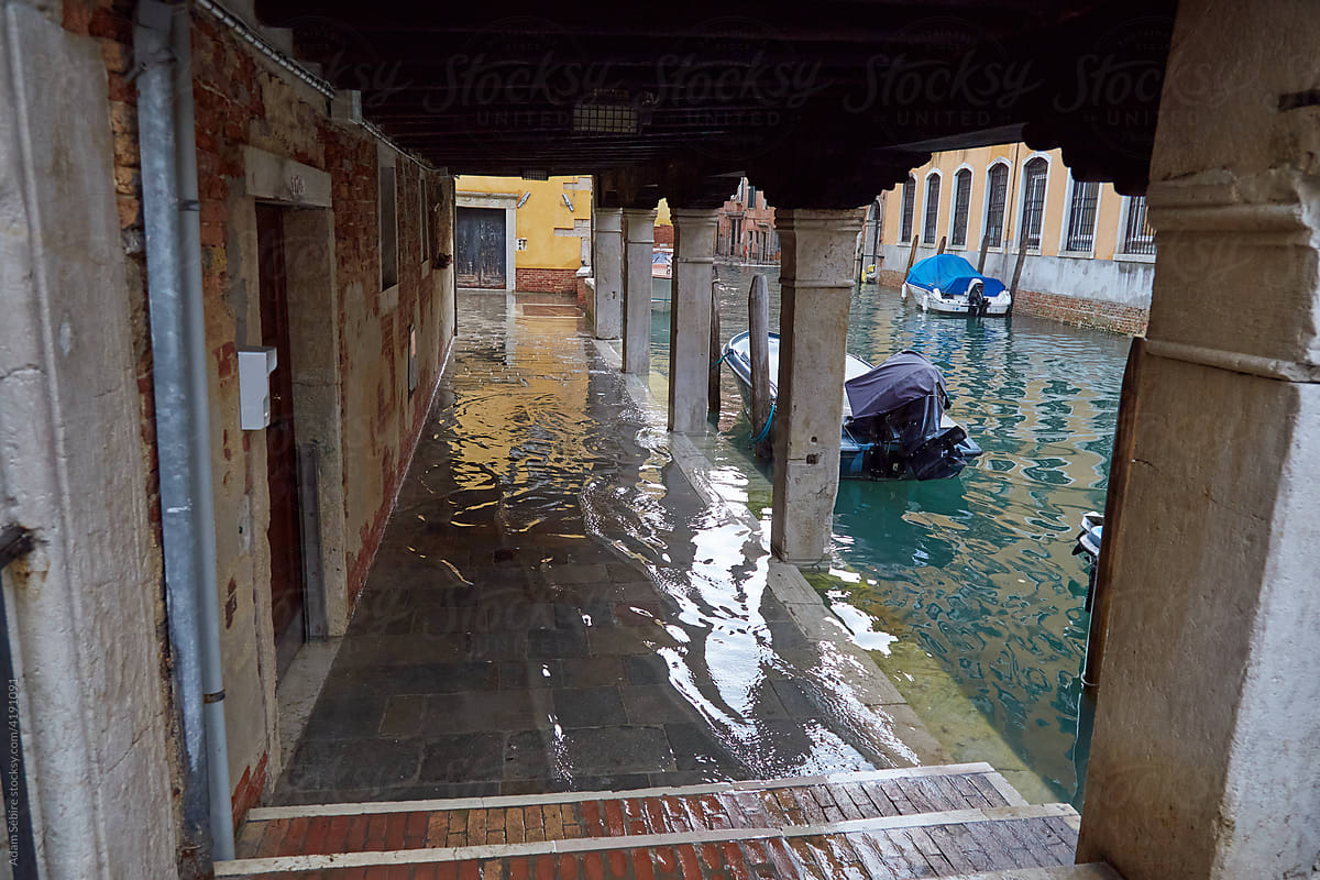 Venice city footpaths inundated by acqua alta floodwater