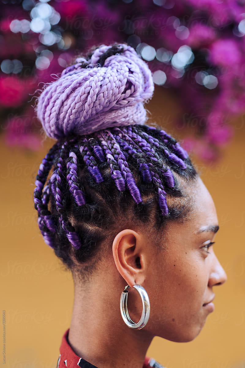Afro hairstyle with violet braids