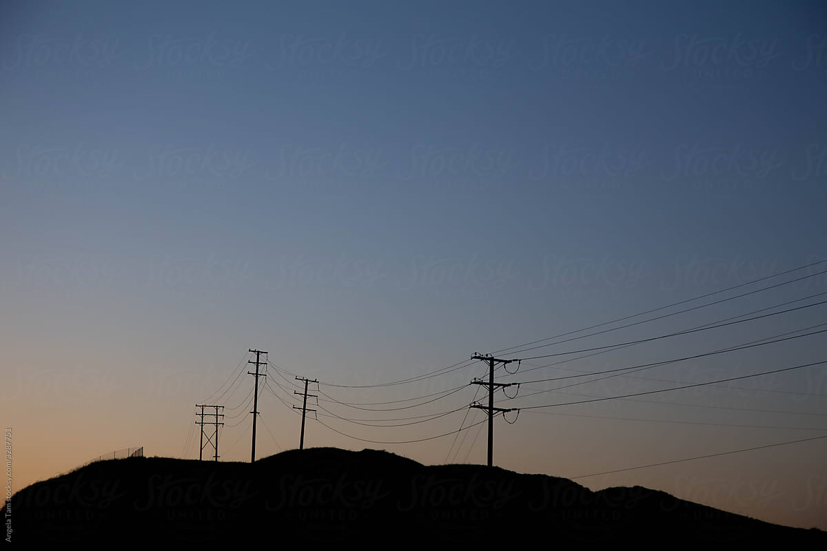 A photo of telephone pole shadows at sunset