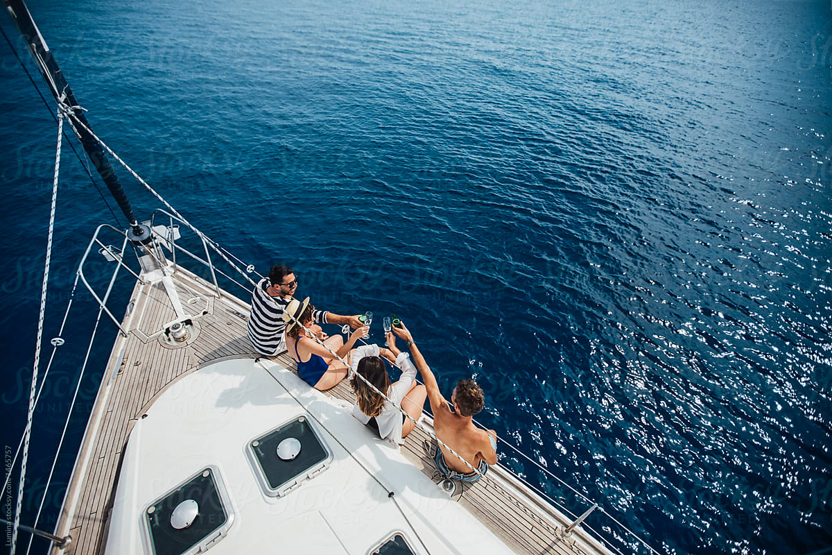Friends Enjoying Summertime on Sailboat