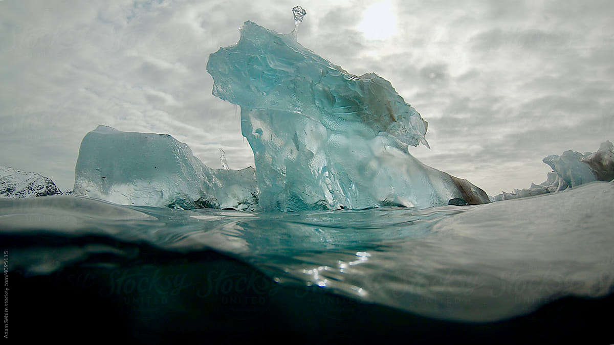Iceberg sculpture at water level, Arctic Greenland spring melt