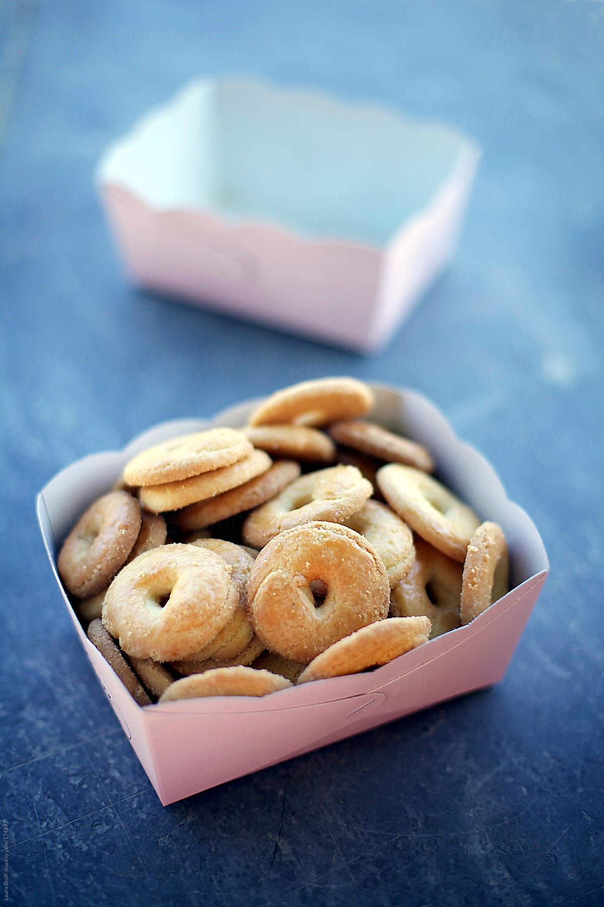 Very typical italian canestrelli biscuits in pink paper box