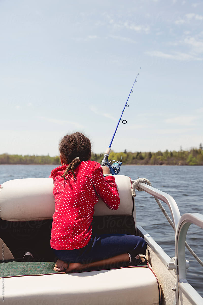 Young Child Fishing With A Rod Off Of A Boat by Stocksy Contributor Anya  Brewley Schultheiss - Stocksy