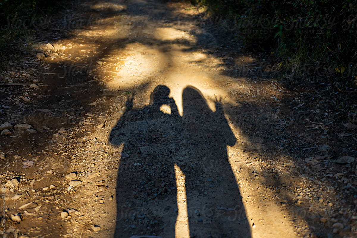 Shadow Of Two Anonymous People Greeting