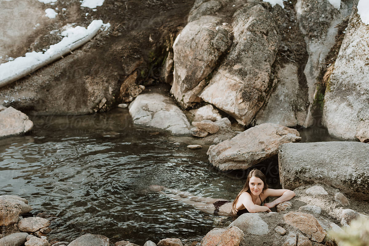 A Woman Relaxes in a Hot Spring