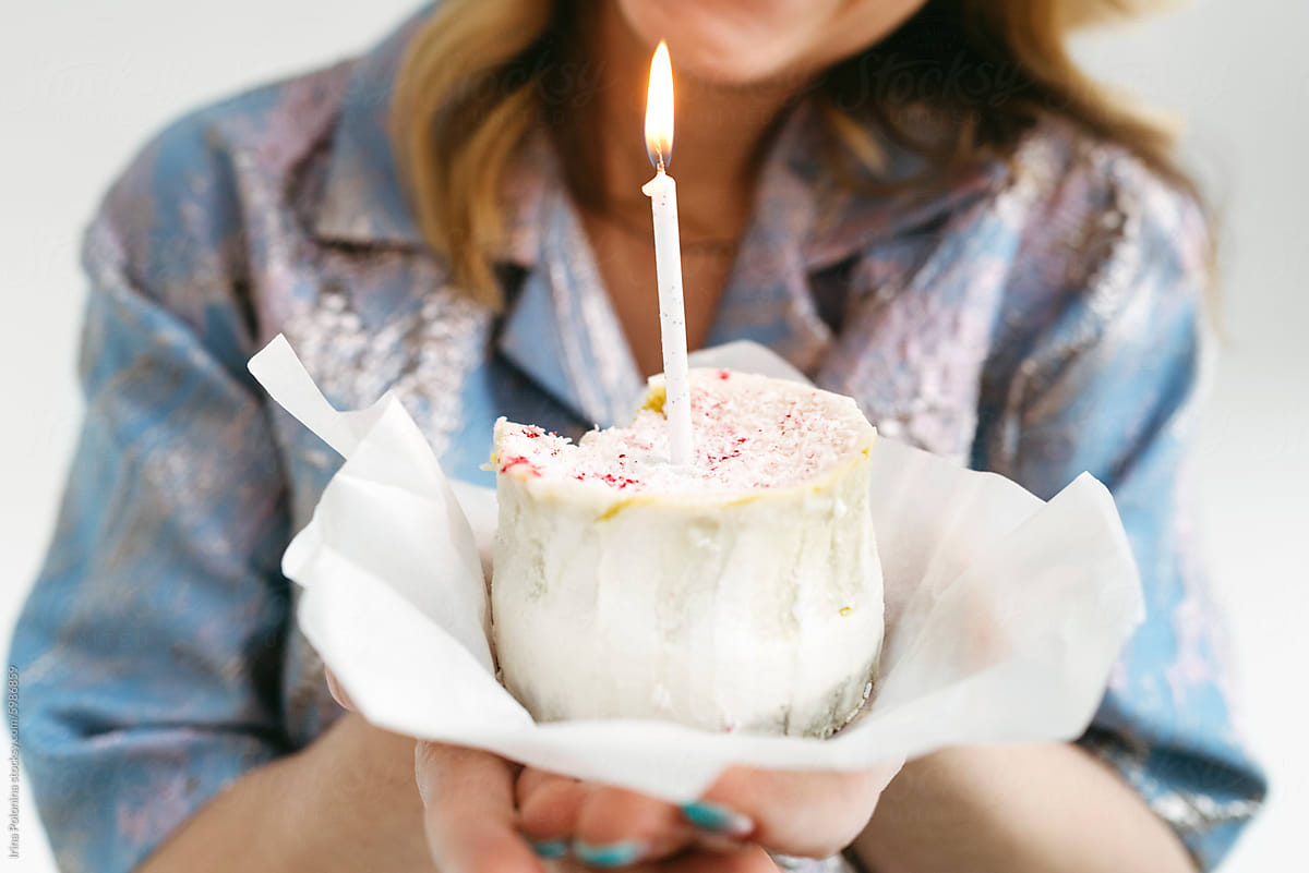 Crop Woman Holding Birthday Cupcake With Lit Candle