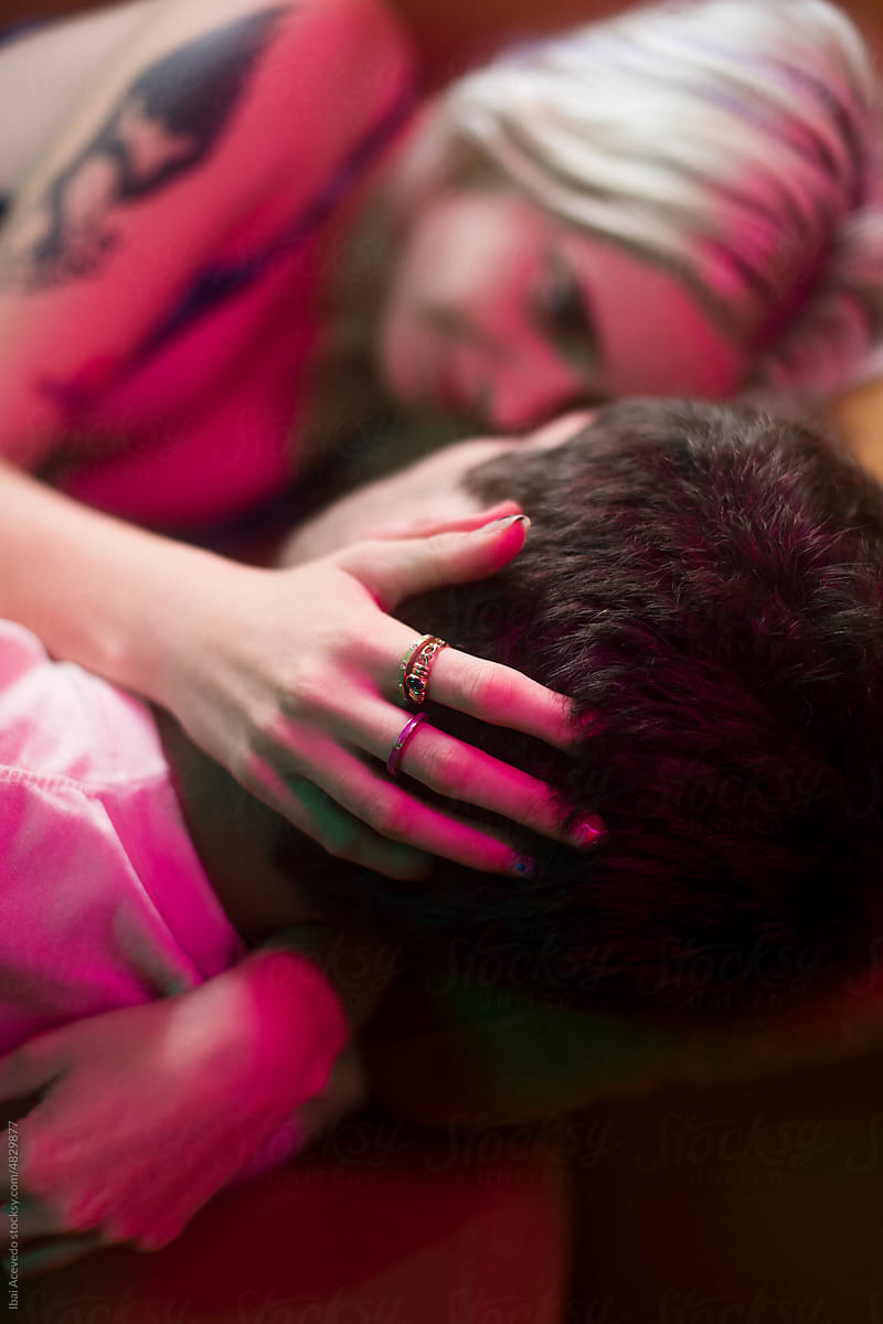 Woman hands caressing lover hair