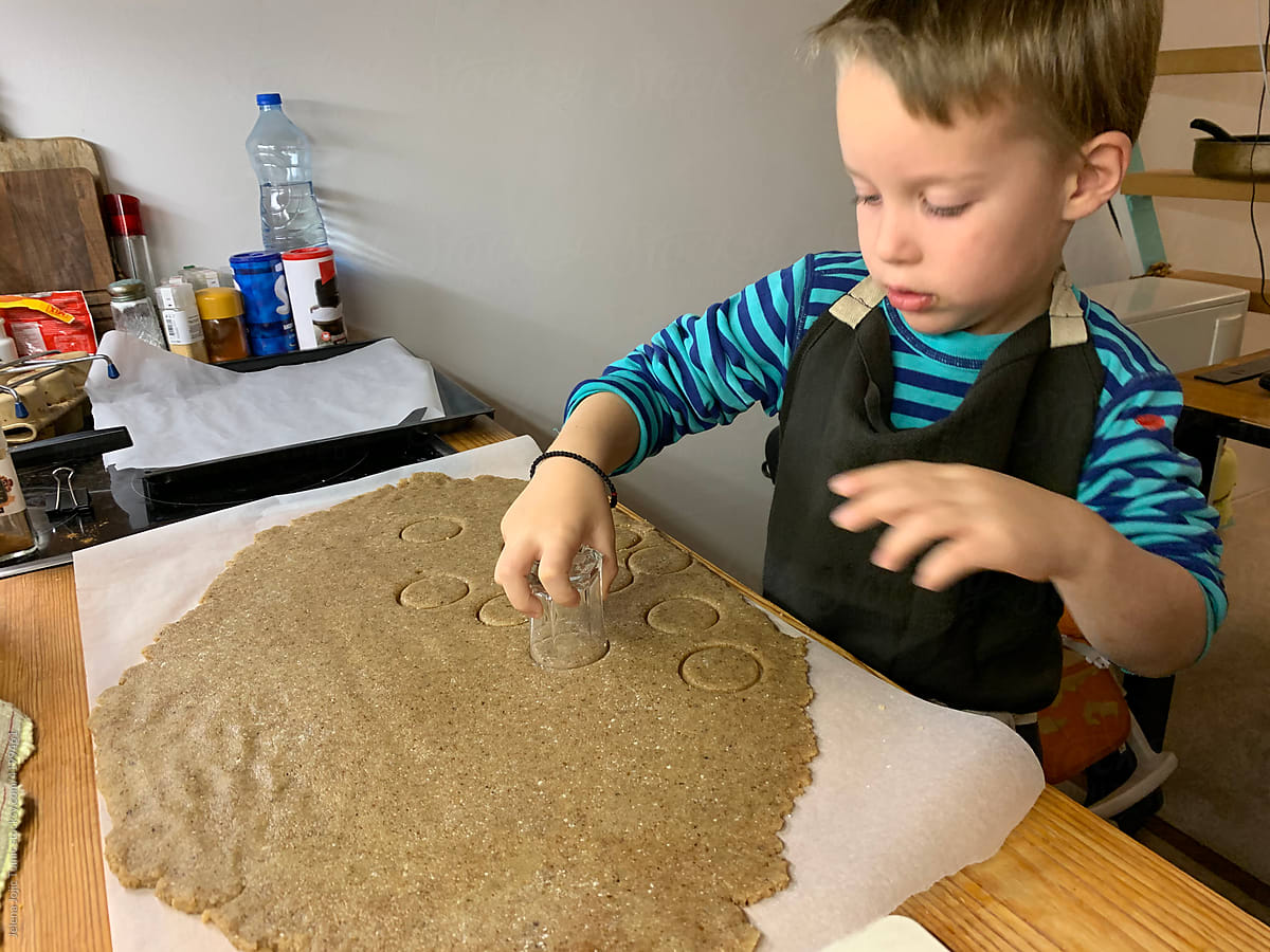 User-generated photo of a boy who is making cookies