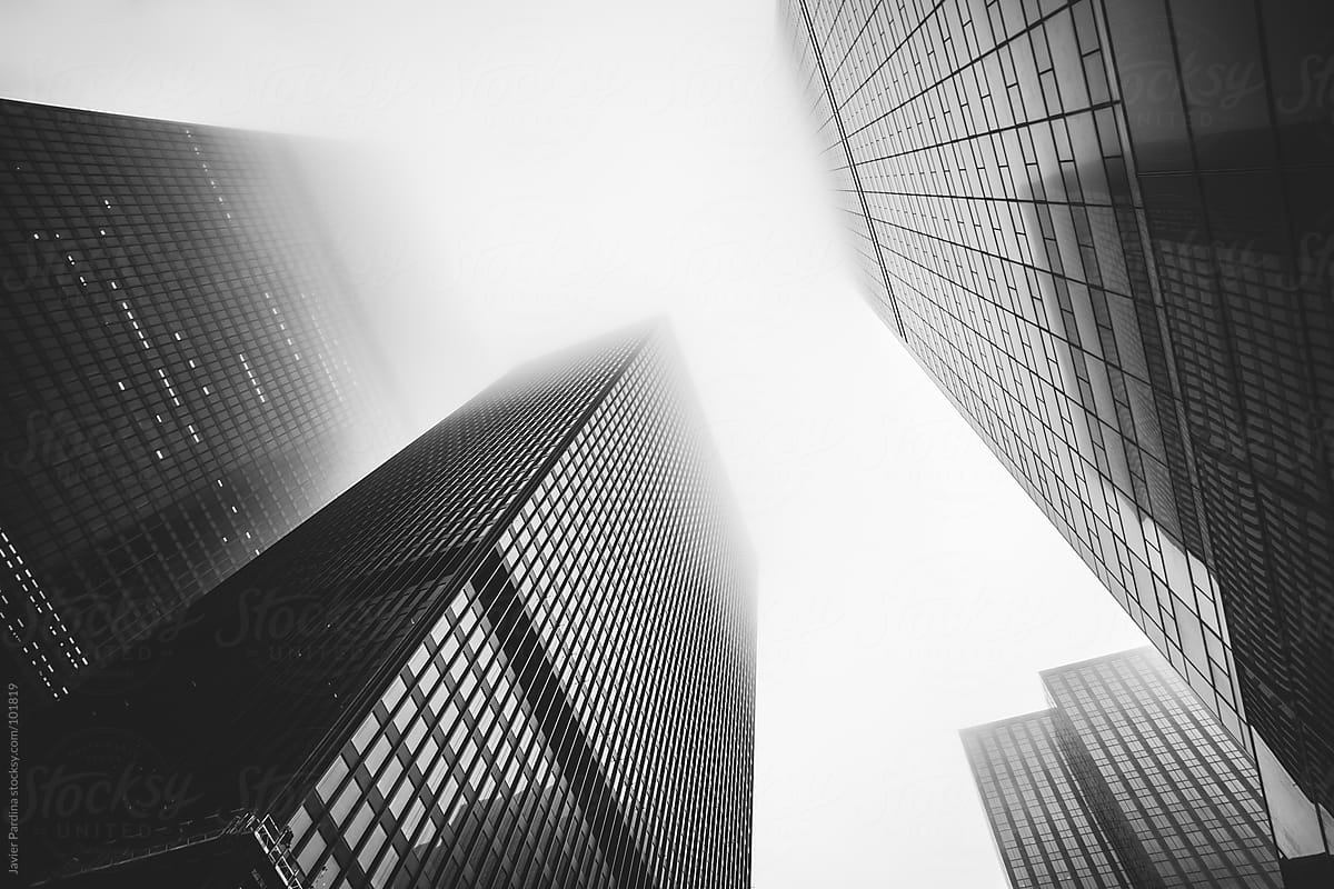 Business skyscrapers in fog