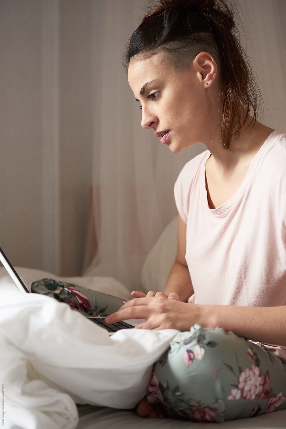 Girl Using Laptop In Bed By Stocksy Contributor Guille Faingold Stocksy 9384