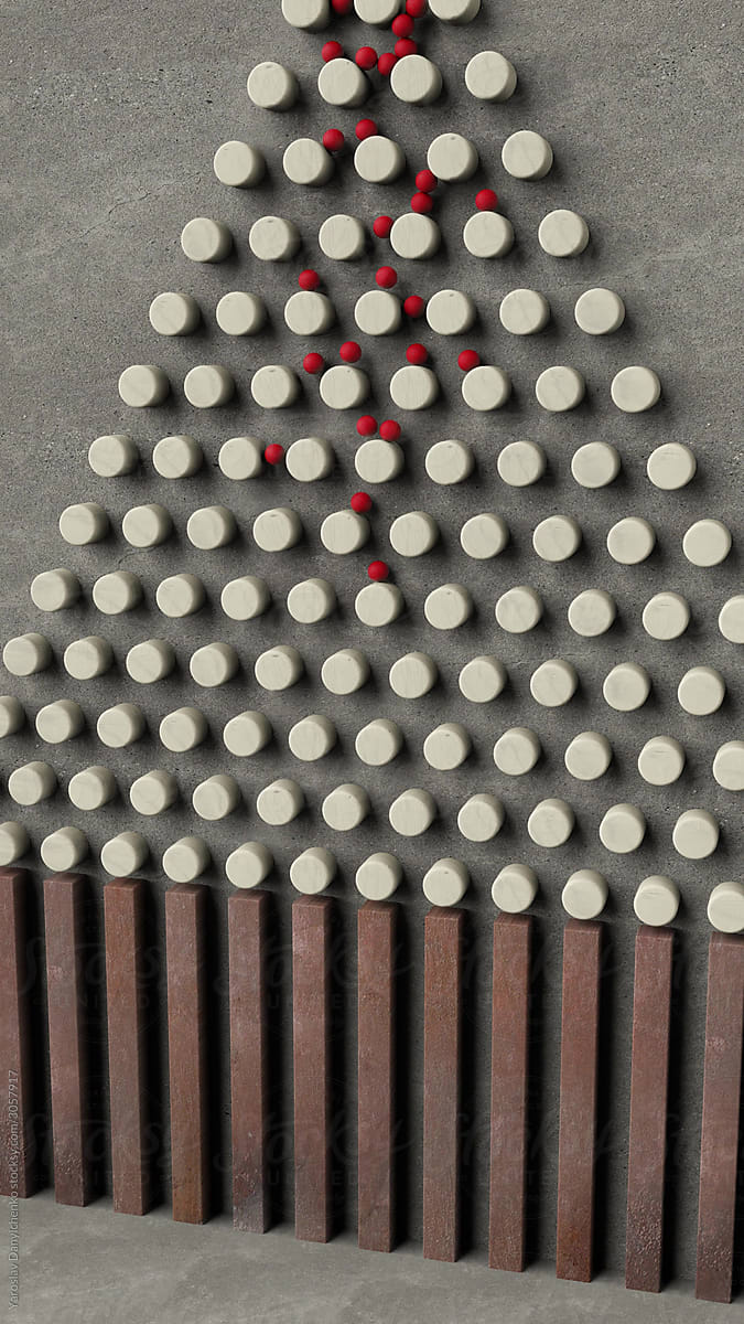 Small red balls falling down through the Galton board