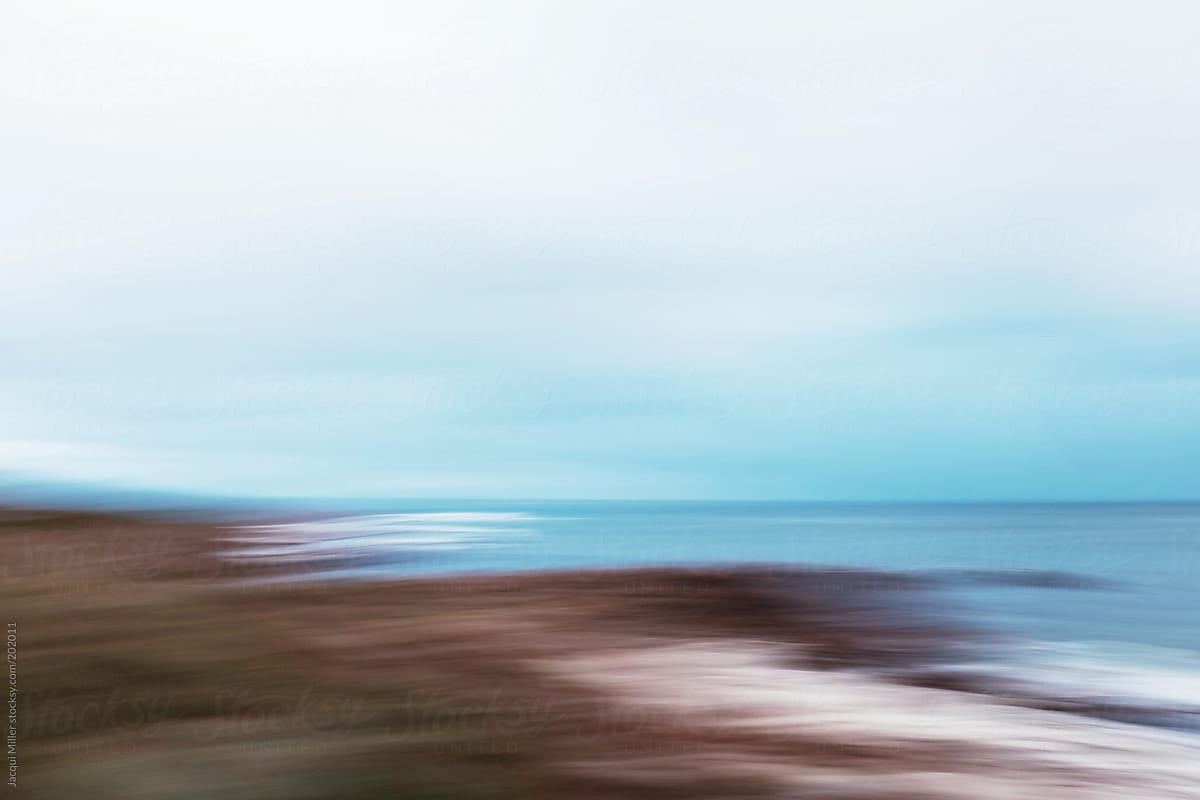 Softly blurred view of a rocky coastline