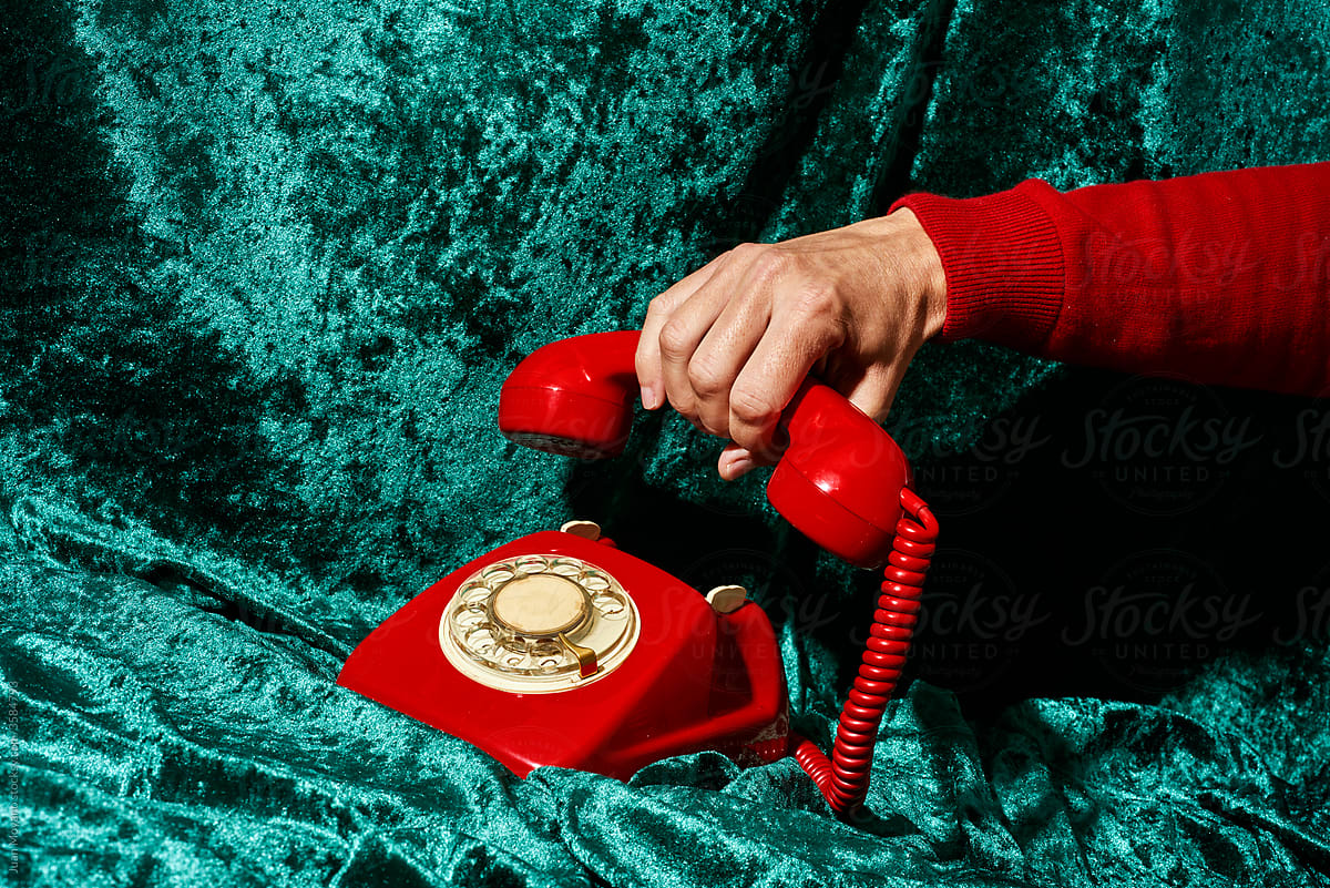 man picking up or hanging up the telephone