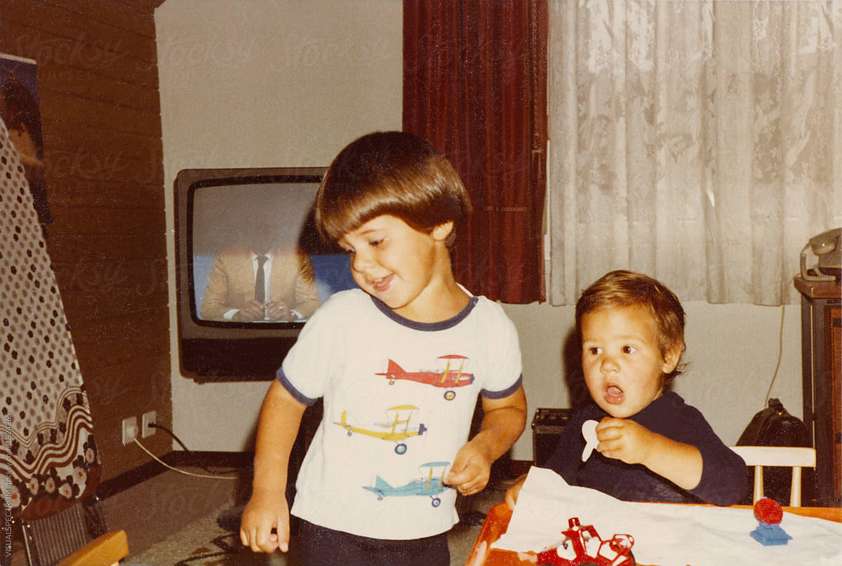 Vintage Photograph of Two Small Kids in a 1980s Home