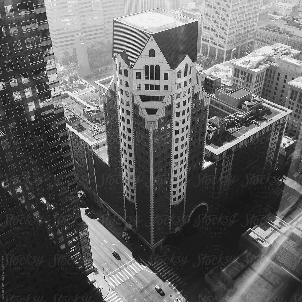 Black and white birds eye view of high rises in downtown Los Angeles.