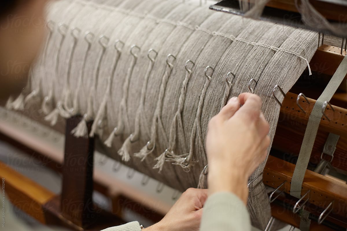 Close up of the warping process in an artisanal textile workshop
