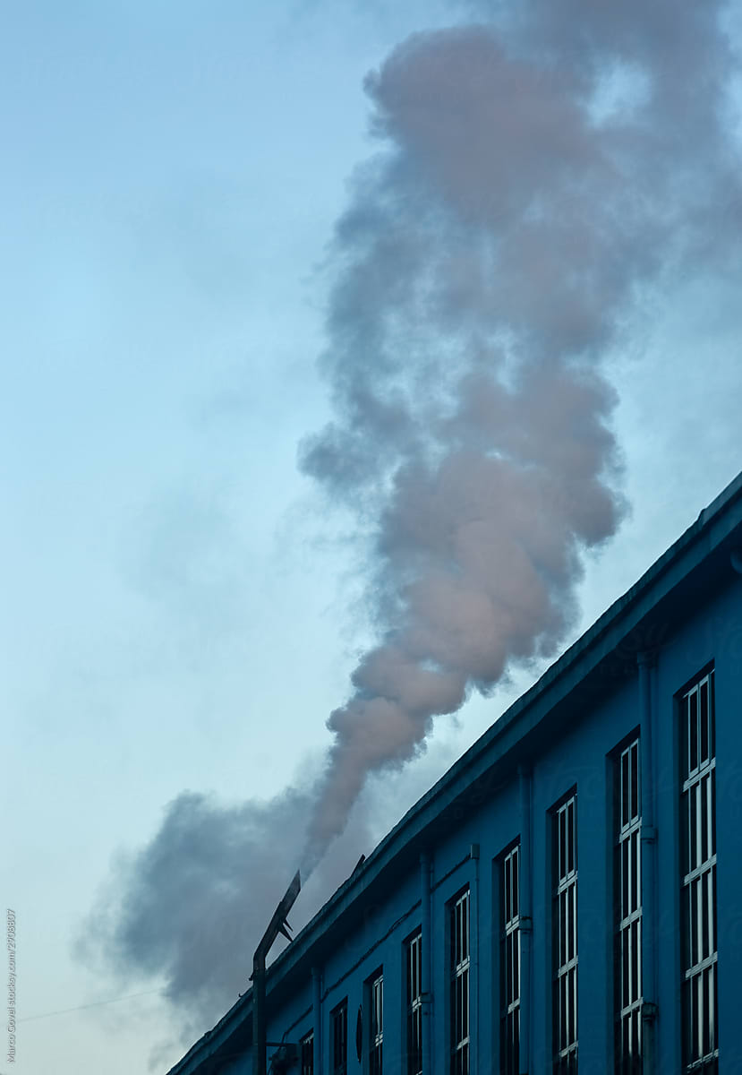 Chimney expelling smoke