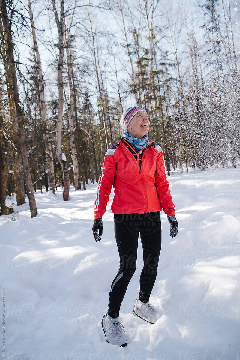 Portrait of runner woman in winter.