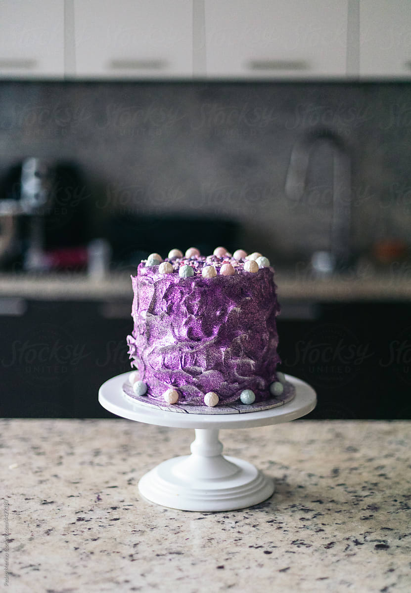 birthday meringue cake in a modern kitchen