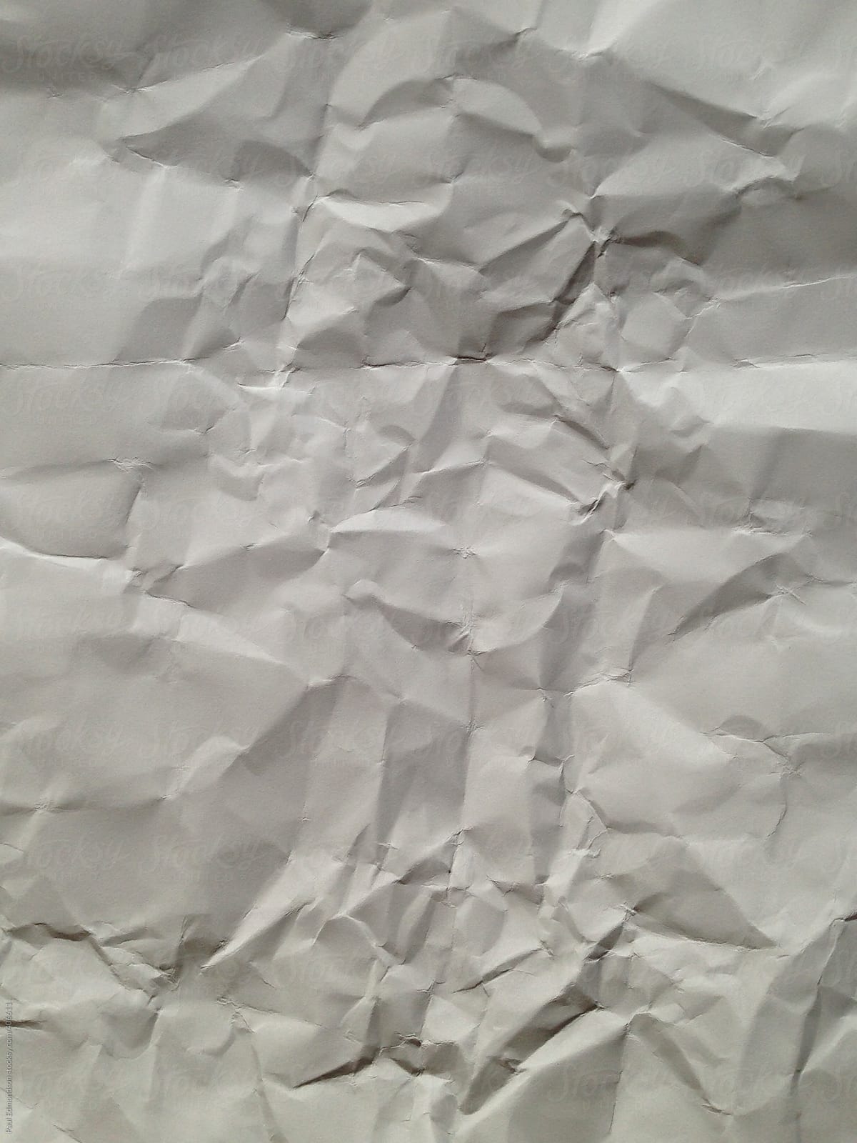 Close Up Of Crumpled Piece Of Construction Paper by Stocksy Contributor  Rialto Images - Stocksy