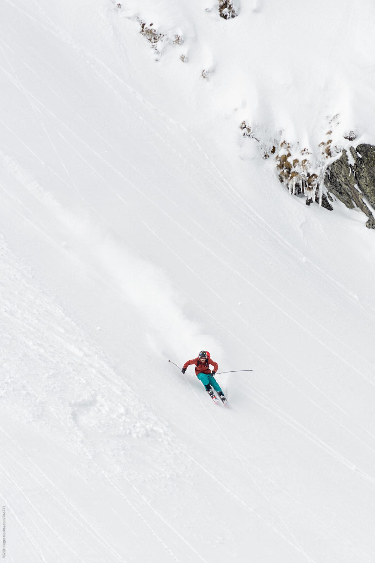 Skier speeding down a snow slope