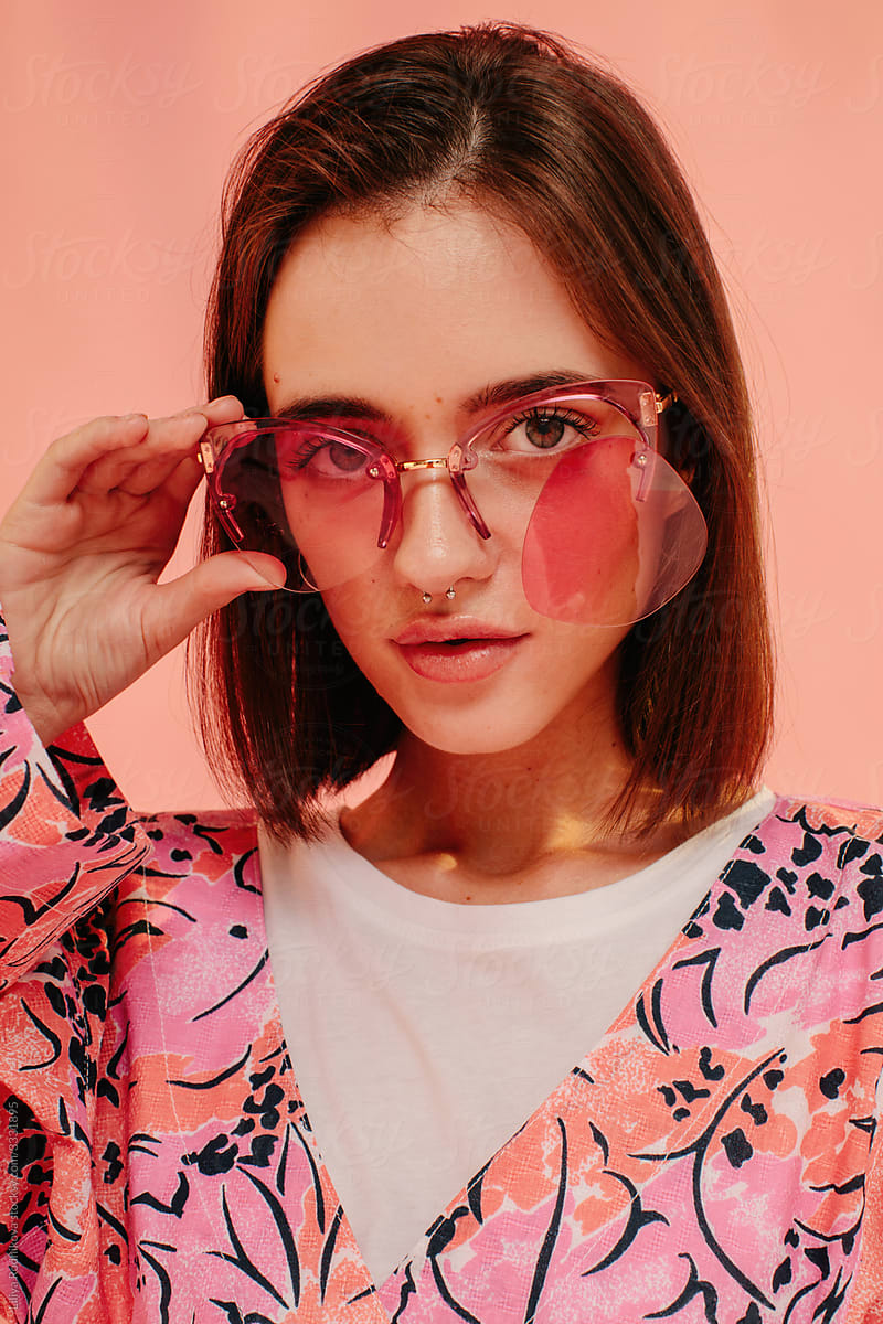 Broken pink glasses concept