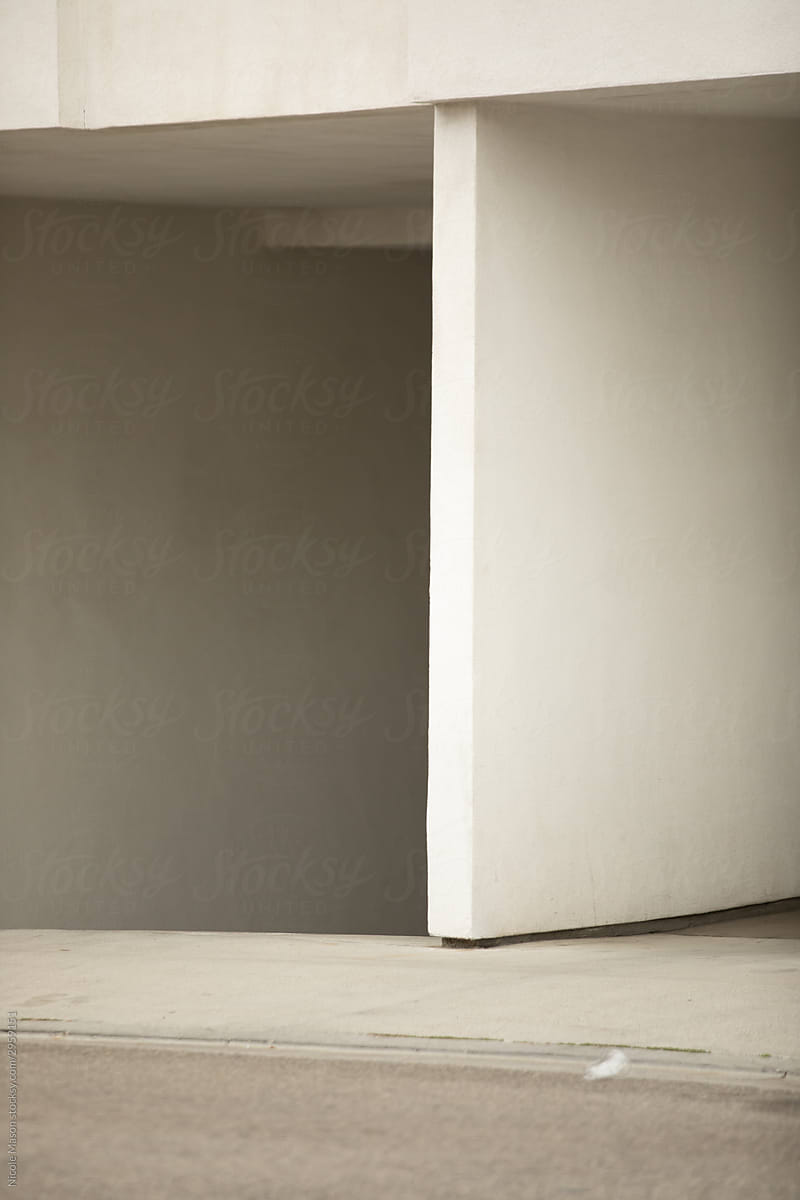 minimal scene of white wall with light and shadow