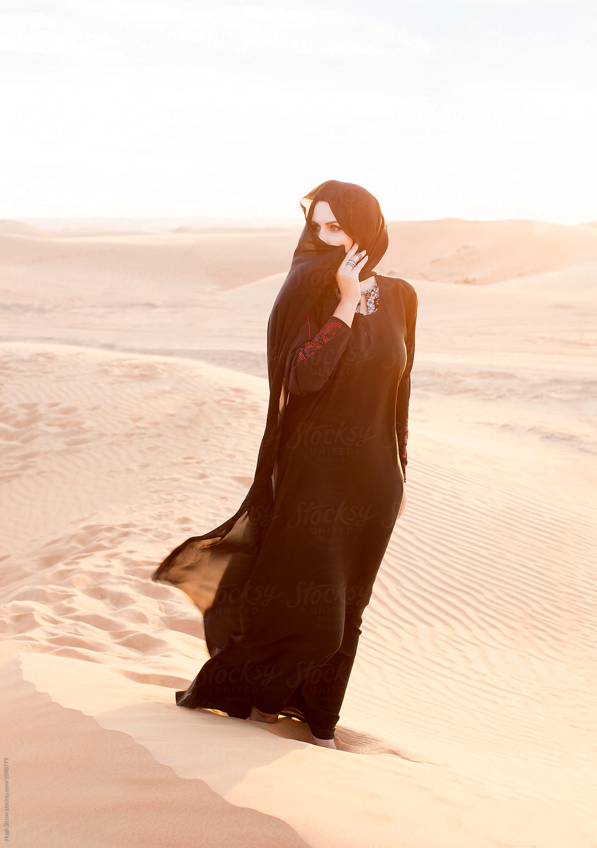 Middle Eastern Woman Wearing Hijab In Desert Dubai By Stocksy Contributor Hugh Sitton