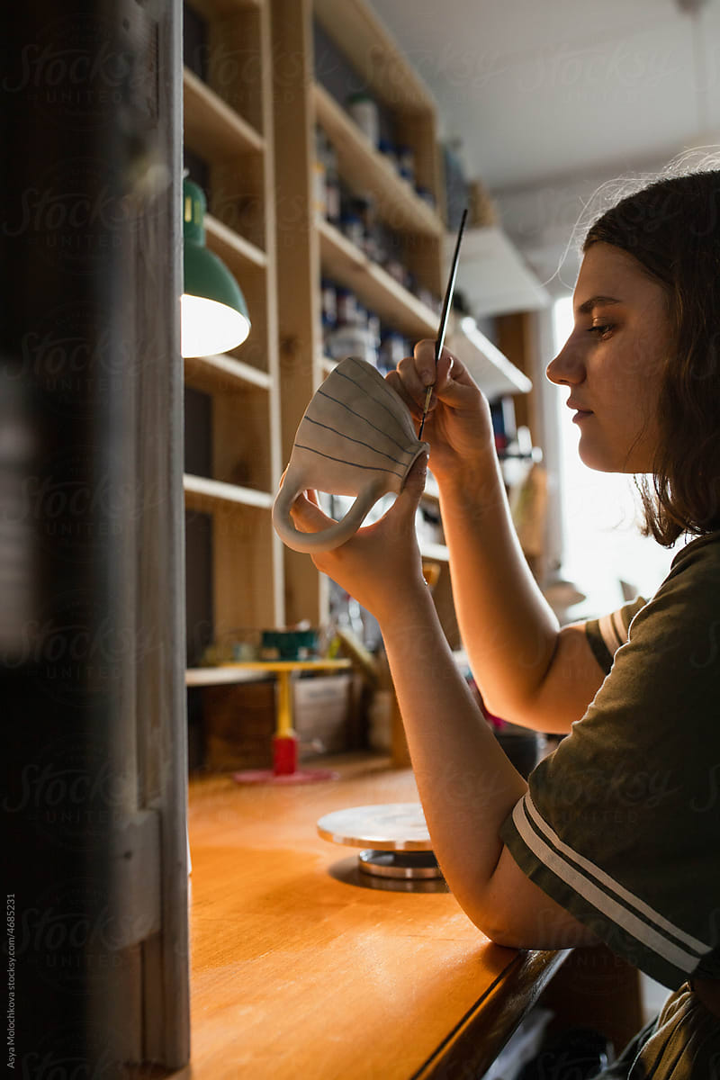 Portrait of a female ceramist at work in the studio