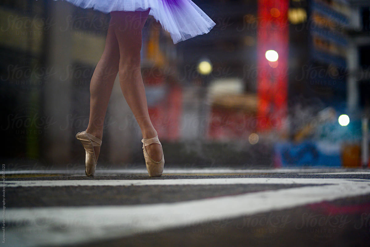 Close up feet of ballerina Dancing in ballet slippers