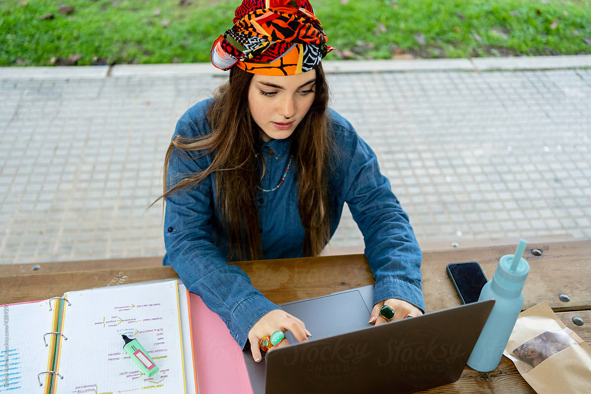 Fashion woman with laptop at university campus