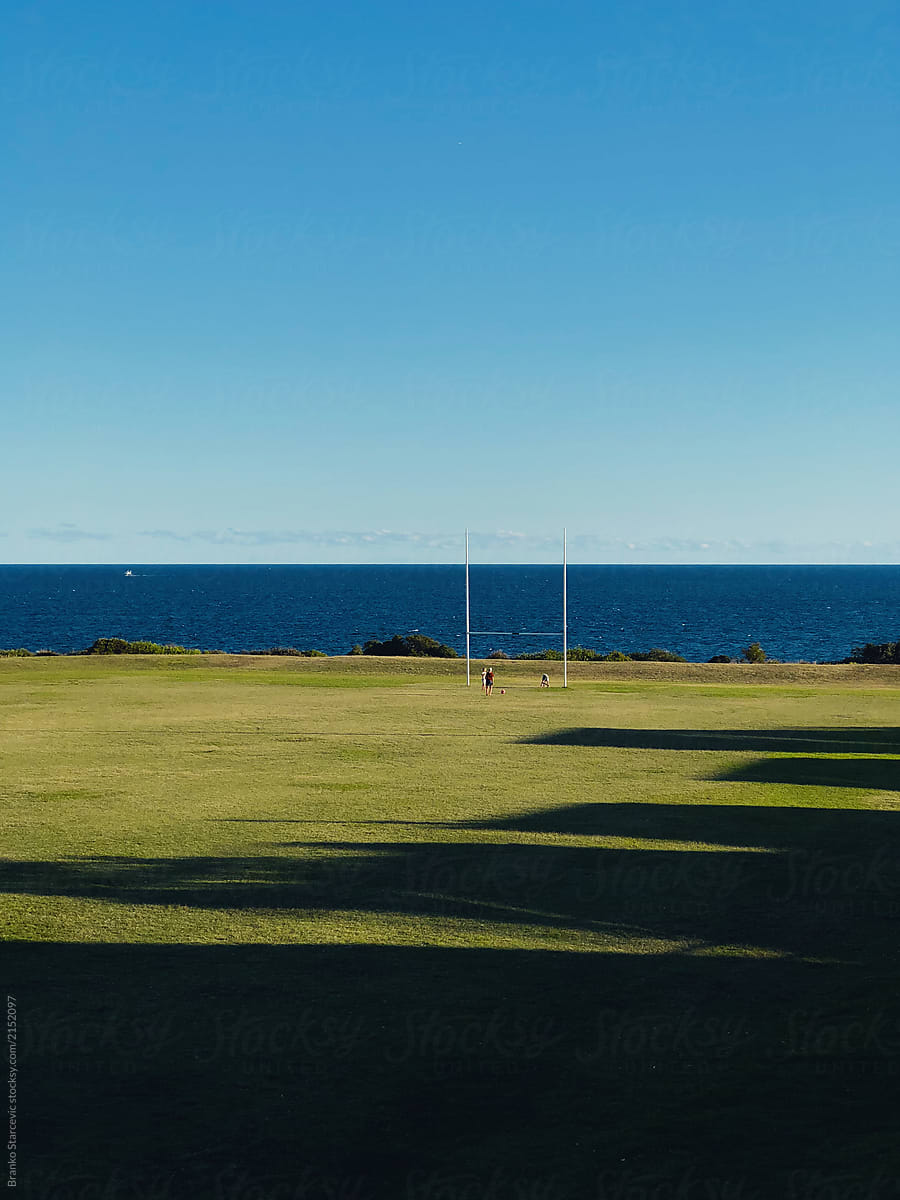 Australian Football pitch with ocean view.