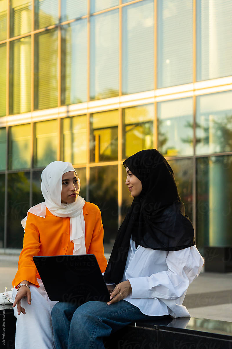 Muslim Women Using The Laptop.