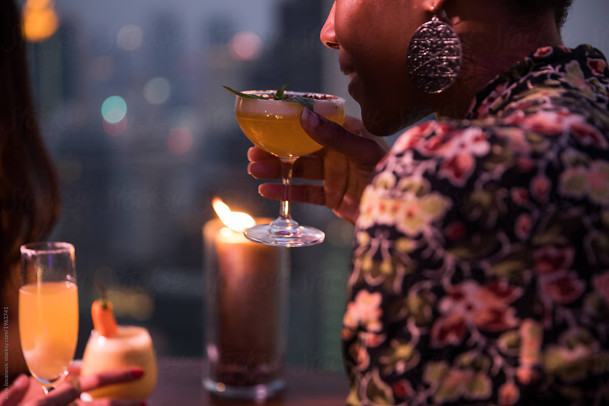 Woman Enjoying Ladies Night drinking cocktail