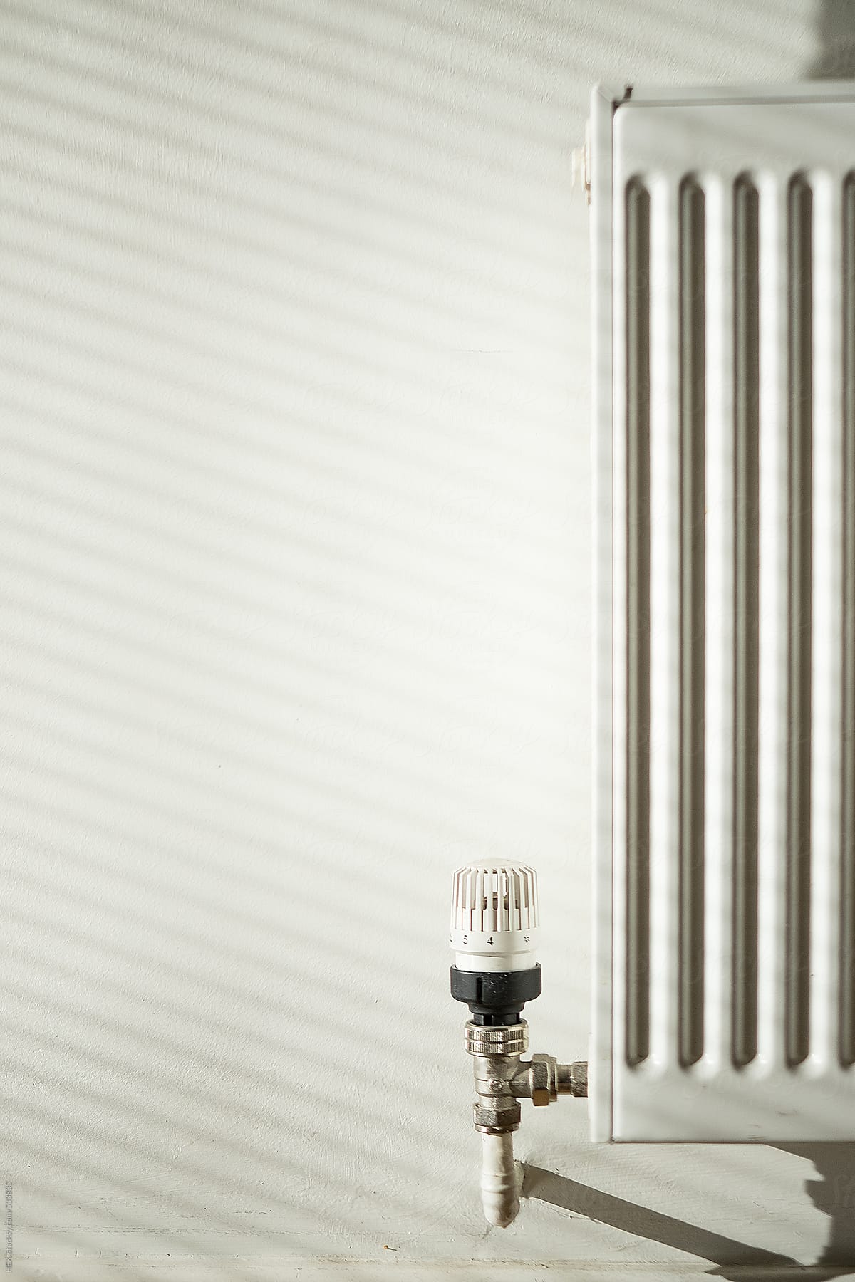Heater on a White Wall . Concept