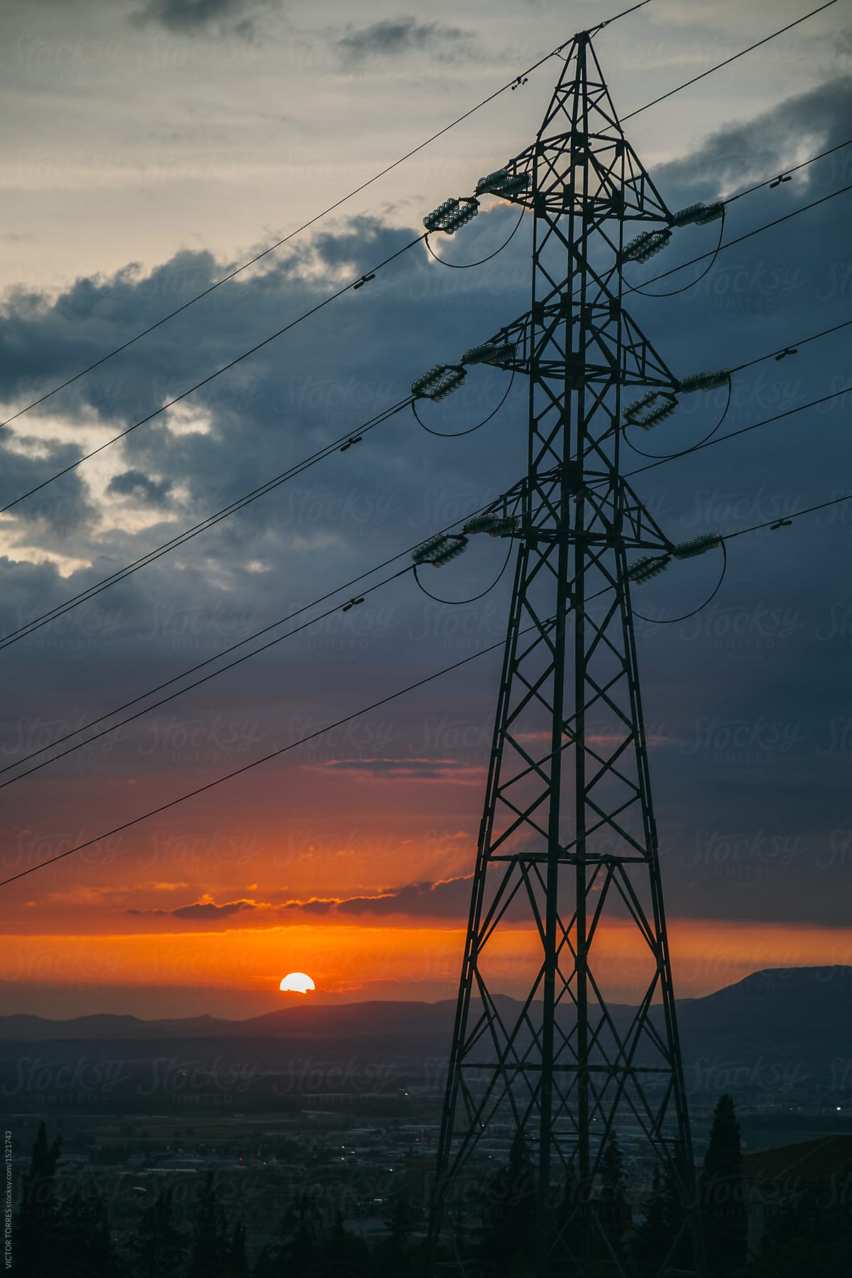 Electrical pylon at sunset