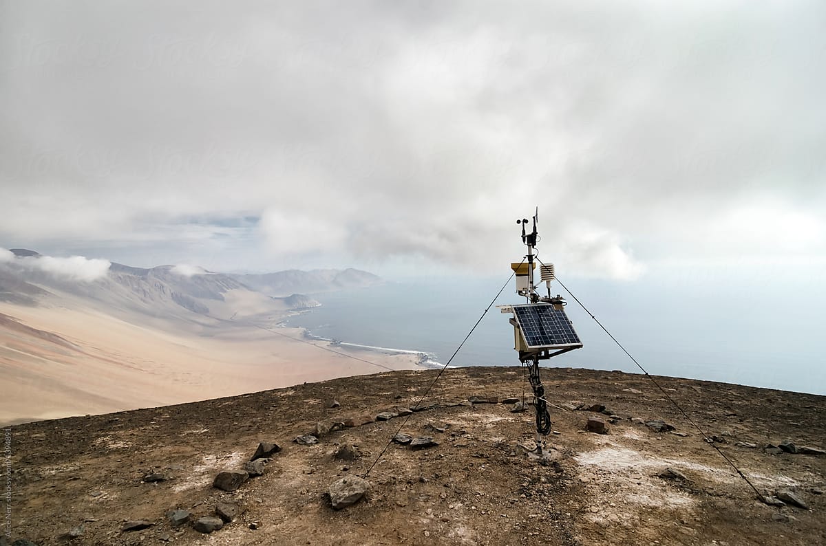Solar panel at the edge of the desert under think nieblina cloud