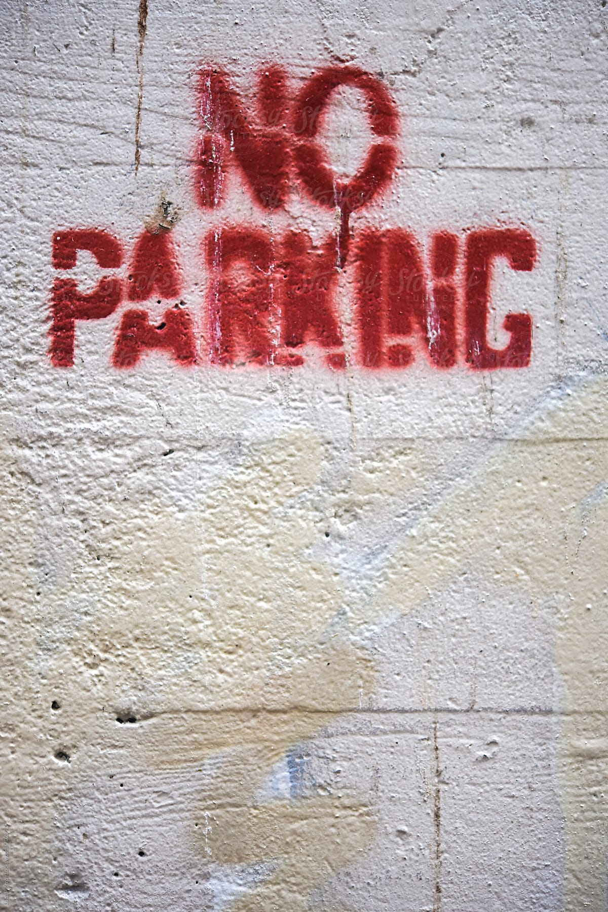 No parking sign on a wall