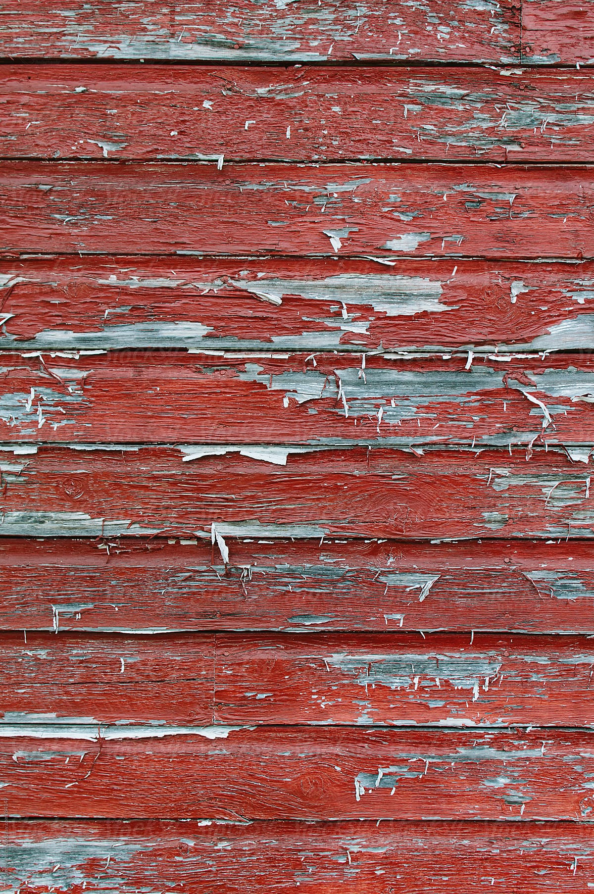 weathered red-painted wall