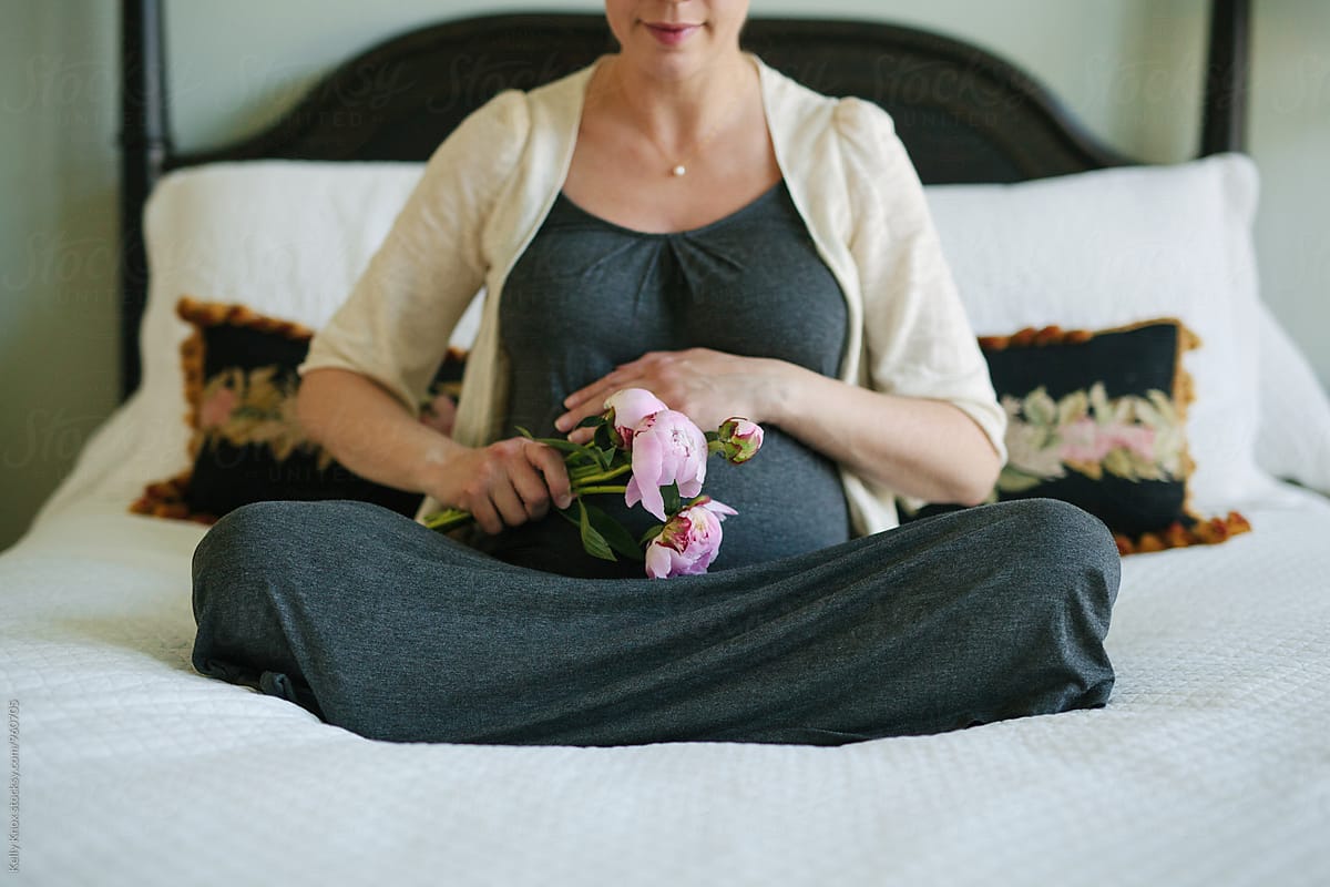 Portrait Of A Pregnant Woman With A Bouquet Of Peonies Del 