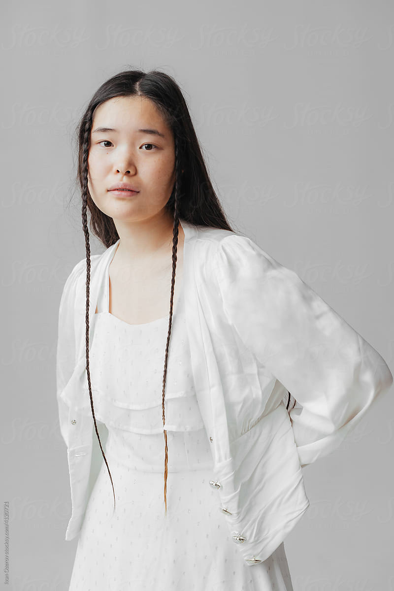 Young Asian woman in white clothes