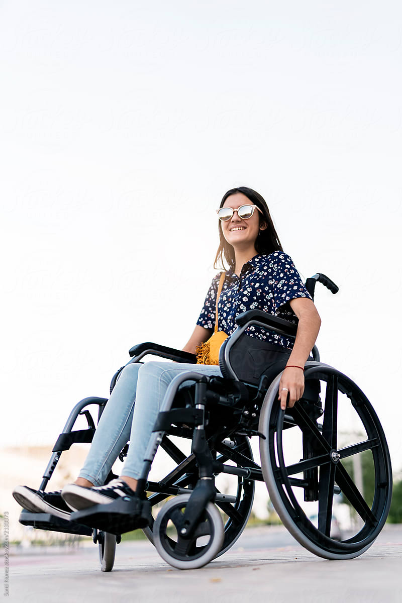 Portrait of beautiful woman on wheelchair