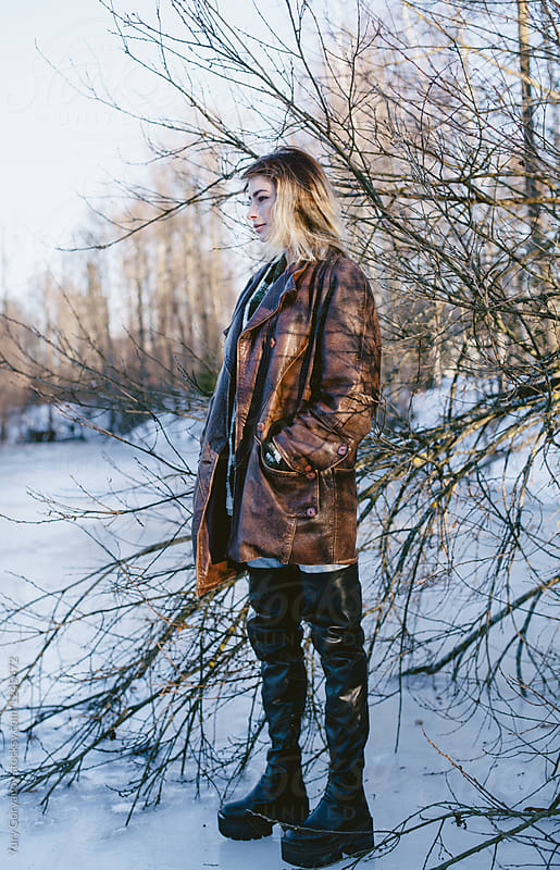Portrait of a grunge girl in the winter in nature