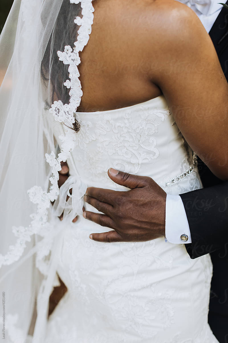 Closeup of Bride and Groom Hugging