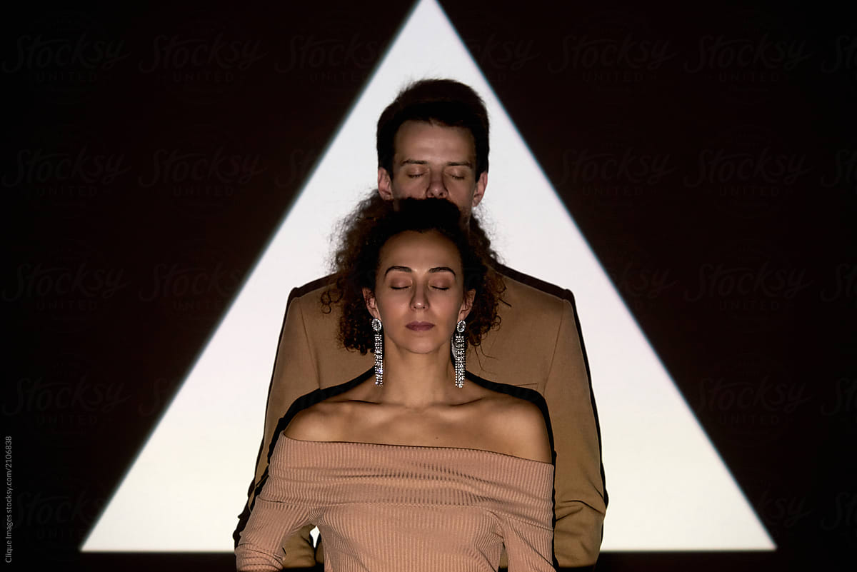 Couple Posing Against Projection