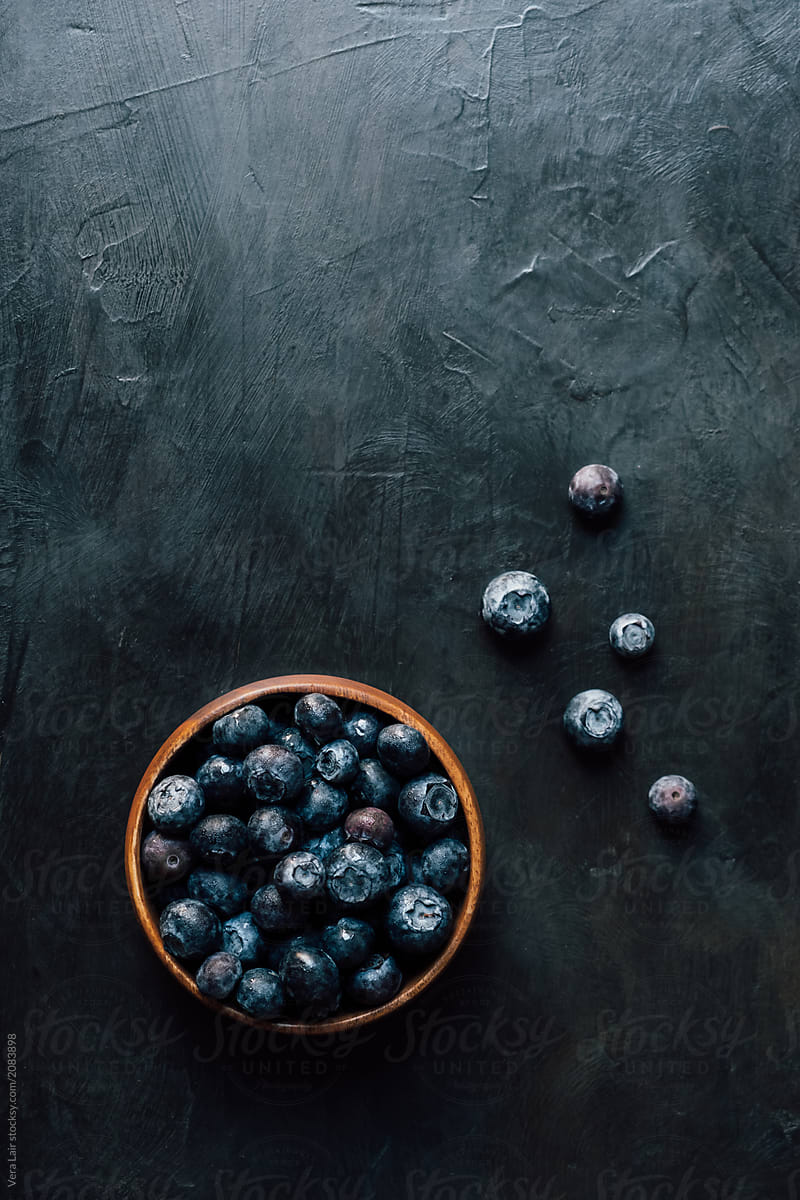 Bowl of fresh blueberries seen from above